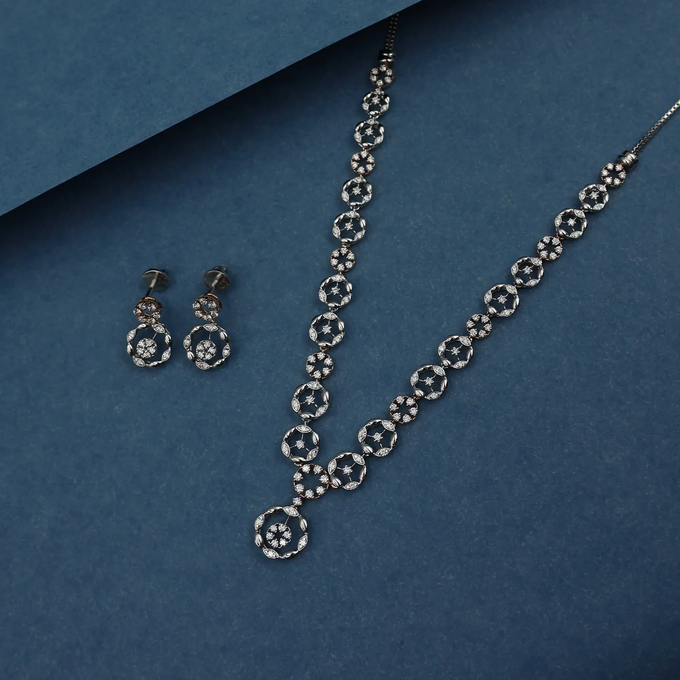 Dishaa platinum necklace and earring set